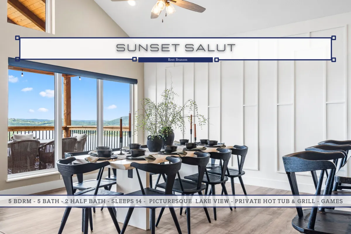 The photo features a large dining table placed to take in breathtaking lake views through expansive windows, with a decorative plant adding a touch of homeliness. The overall mood is one of relaxed elegance—ideal for family meals or lively gatherings.